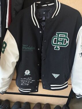 H&M Black and White Varsity Jacket with Green Patches